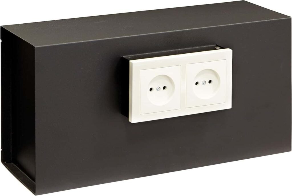 Caja fuerte camuflada Arregui, negra con 2 enchufes de color blanco simulados